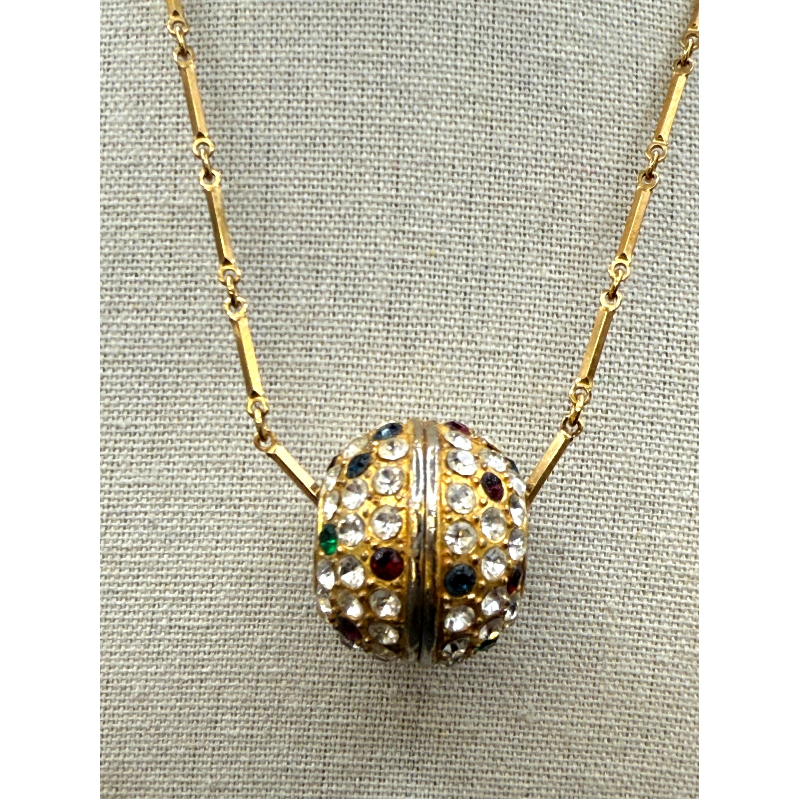 Vintage Gold Tone Spherical Pendent Embellished With Crystals Of Different Color